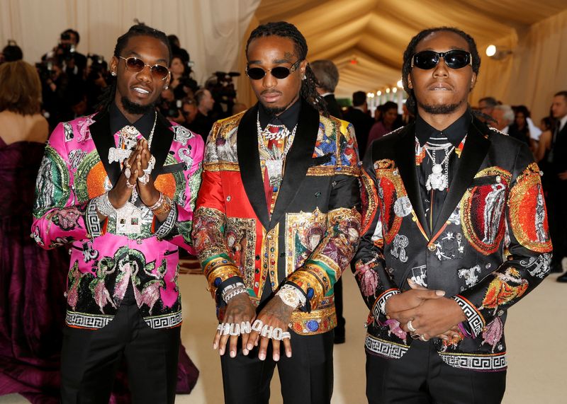 © Reuters. FILE PHOTO: (L-R) Offset, Quavo and Takeoff of Migos arrive at the Metropolitan Museum of Art Costume Institute Gala (Met Gala) to celebrate the opening of 