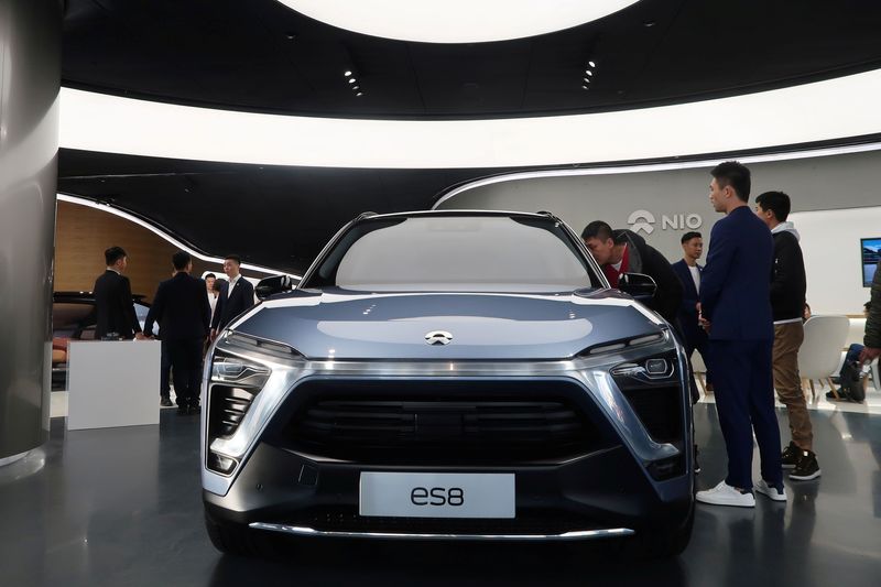 &copy; Reuters. FILE PHOTO: NIO ES8, an all-electric sport utility vehicle, is displayed inside a NIO House "brand experience" store, in Beijing, China November 25, 2017.  REUTERS/Norihiko Shirouzu