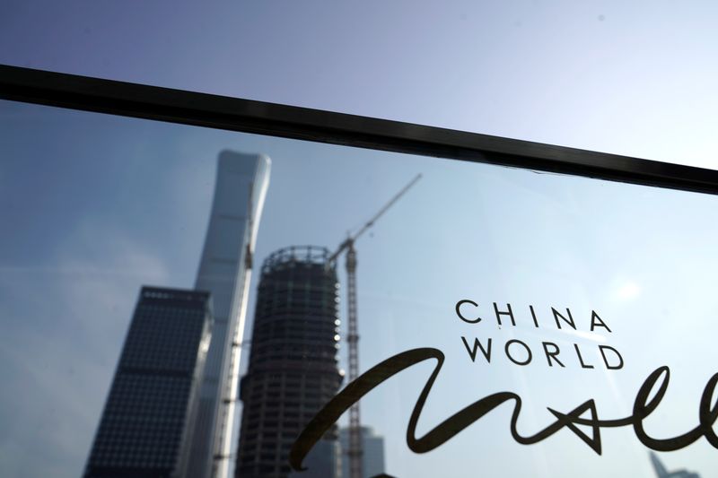 &copy; Reuters. FILE PHOTO: The sign of China World is seen near buildings in Beijing's central business area, China January 17, 2020. REUTERS/Jason Lee