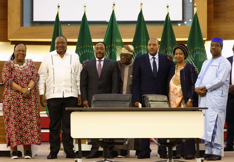 &copy; Reuters. South Africa's Minister for International Relations and Cooperation Naledi Pandor, former Kenyan President Uhuru Kenyatta, Ethiopian government representative Redwan Hussien, former Nigerian president and African Union envoy Olesegun Obasanjo, Tigray dele