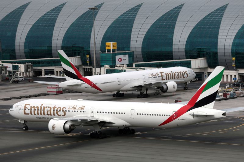 &copy; Reuters. FILE PHOTO: Emirates Airline Boeing 777-300ER planes are seen at Dubai International Airport in Dubai, United Arab Emirates, February 15, 2019. REUTERS/Christopher Pike/File Photo