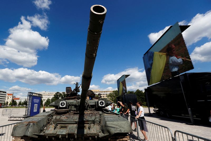 &copy; Reuters. FILE PHOTO: People look at Russian military equipment destroyed by the Armed Forces of Ukraine displayed, as Russia's attack on Ukraine continues, in Prague, Czech Republic, July 11, 2022.  REUTERS/David W Cerny/File Photo