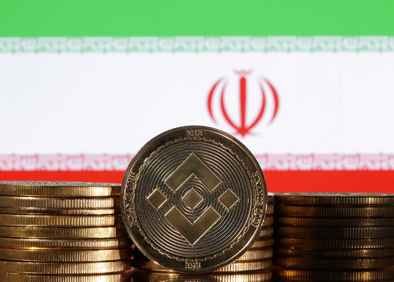 &copy; Reuters. Representations of cryptocurrency Binance are seen in front of displayed Iran flag in this illustration taken November 3, 2022. REUTERS/Dado Ruvic/Illustration