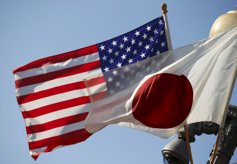 &copy; Reuters. FILE PHOTO: The U.S. and Japan flags fly together outside the White House in Washington April 27, 2015. REUTERS/Kevin Lamarque