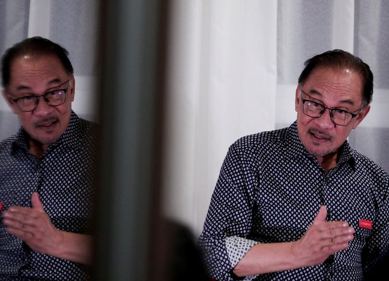 &copy; Reuters. FILE PHOTO: Malaysian opposition leader Anwar Ibrahim speaks during an interview with Reuters in Tambun, Perak, Malaysia November 4, 2022. REUTERS/Hasnoor Hussain