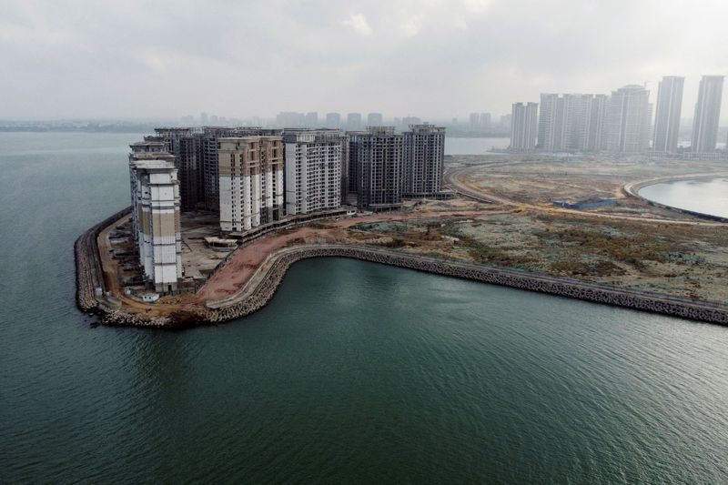 &copy; Reuters. FILE PHOTO: An aerial view shows the 39 buildings developed by China Evergrande Group that authorities have issued demolition order on, on the man-made Ocean Flower Island in Danzhou, Hainan province, China January 7, 2022. REUTERS/Aly Song