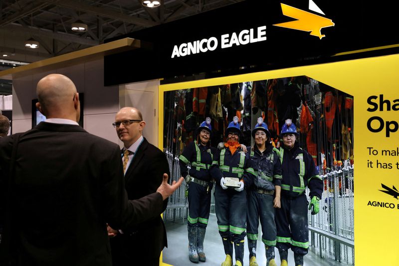 &copy; Reuters. FILE PHOTO: A visitor speaks to a representative of Agnico Eagle Mines Ltd at the Prospectors and Developers Association of Canada (PDAC) annual conference in Toronto, Ontario, Canada, March 1, 2020.  REUTERS/Chris Helgren