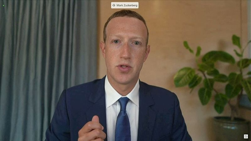 &copy; Reuters. FILE PHOTO: Facebook CEO Mark Zuckerberg testifies remotely via videoconference in this screengrab made from video during a Senate Judiciary Committee hearing titled, "Breaking the News: Censorship, Suppression, and the 2020 Election on Facebook and Twitt