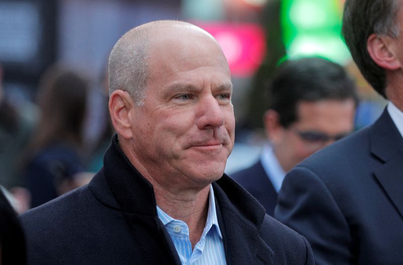 &copy; Reuters. FILE PHOTO: Jon Winkelried, CEO of private-equity firm TPG, celebrates his company's IPO outside the Nasdaq Market site in Times Square in New York City, U.S., January 13, 2022.  REUTERS/Brendan McDermid/File photo