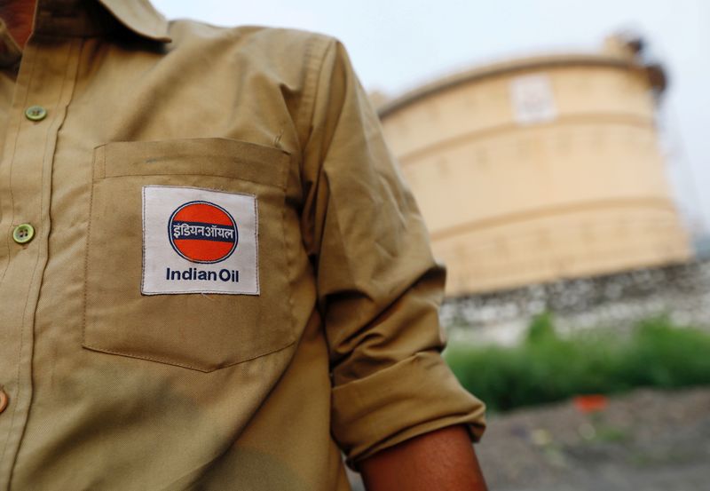 &copy; Reuters. FILE PHOTO: An Indian Oil tanker driver waits outside a fuel depot in Mumbai, India, October 6, 2017. REUTERS/ Danish Siddiqui/File Photo/File Photo