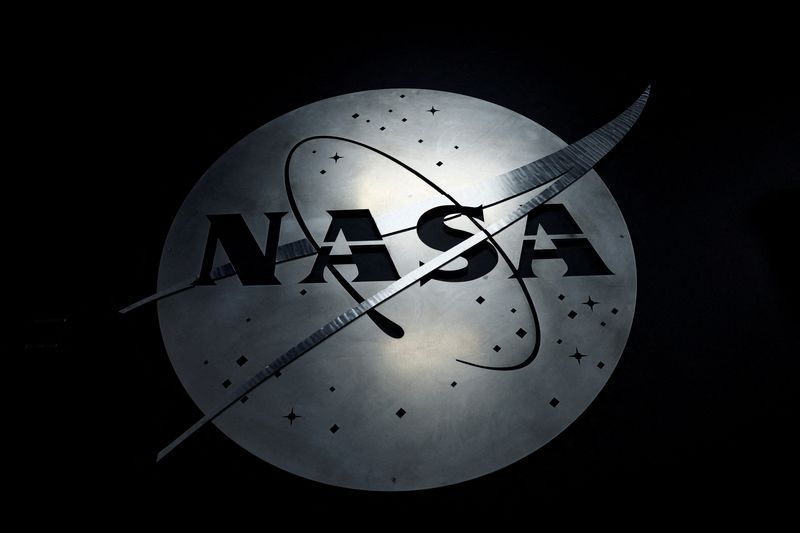 &copy; Reuters. FILE PHOTO: The NASA logo hangs in the Mission Operations Control Center at Wallops Flight Facility on Wallops Island, Virginia, U.S., October 26, 2022. REUTERS/Evelyn Hockstein/File Photo