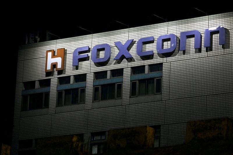 &copy; Reuters. FILE PHOTO: The logo of Foxconn is seen outside the company's building in Taipei, Taiwan November 10, 2022. REUTERS/Ann Wang