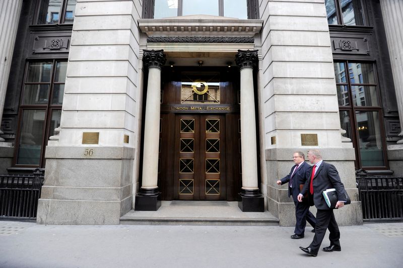 &copy; Reuters. FILE PHOTO: Men walk past the London Metal Exchange (LME) in London, July 22, 2011. Picture taken July 22, 2011.  REUTERS/Paul Hackett/File Photo