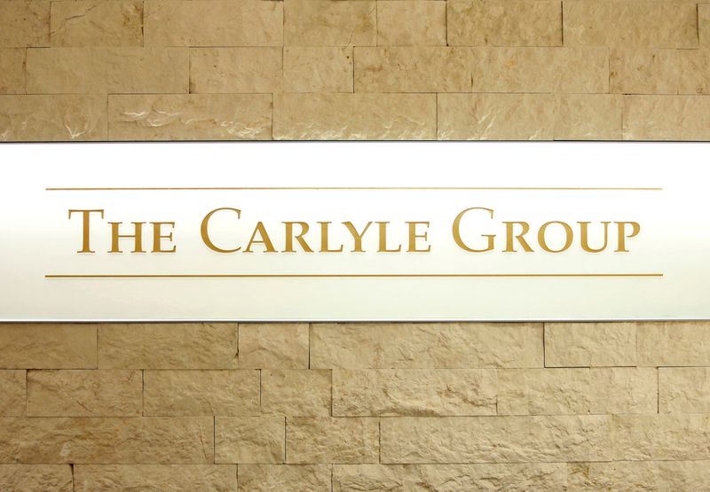 &copy; Reuters. FILE PHOTO: The logo of the Carlyle Group is displayed at the company's office in Tokyo, Japan October 17, 2018. REUTERS/Issei Kato