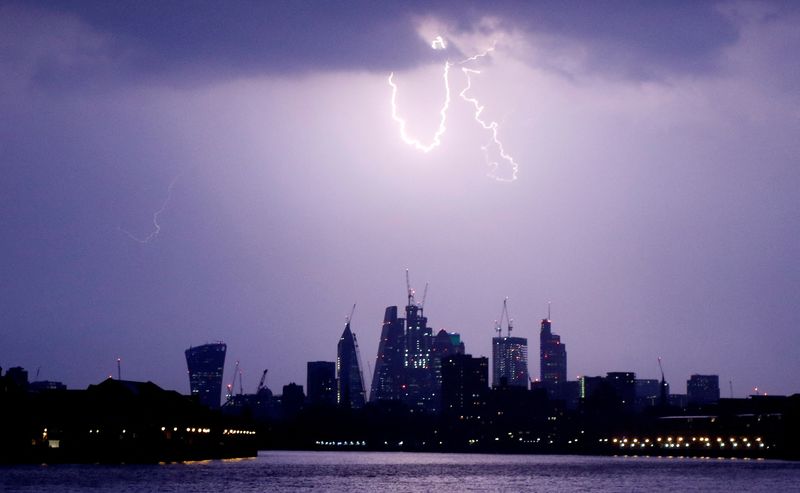 &copy; Reuters. FILE PHOTO: General view as lightning strikes over the city of London, Britain May 26, 2018. REUTERS/Tom Jacobs