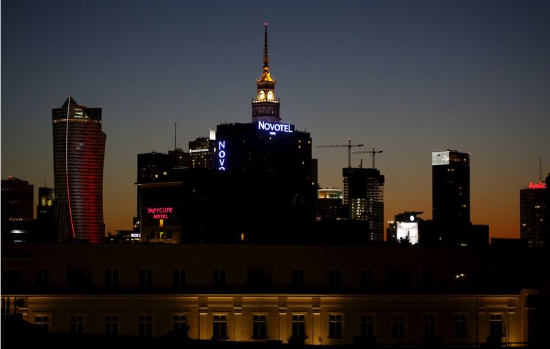 &copy; Reuters. FILE PHOTO: The skyline of Warsaw, center is pictured after sunset, in Poland August 19, 2015. REUTERS/Kacper Pempel