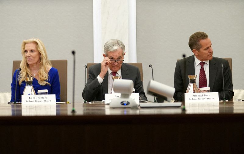 &copy; Reuters. FILE PHOTO: Flanked by Federal Reserve Vice Chairs Lael Brainard and Michael Barr, Fed Chair Jerome Powell delivers opening remarks to the "Fed Listens: Transitioning to the Post-pandemic Economy" event in Washington, U.S., September 23, 2022. REUTERS/Kev