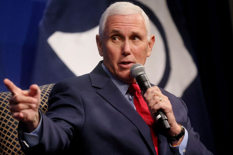 © Reuters. FILE PHOTO: Former U.S. Vice President Mike Pence is interviewed by Kevin Roberts, president of the Heritage Foundation, in front of an audience at the Heritage Foundation in Washington, U.S., October 19, 2022. REUTERS/Leah Millis/File Photo