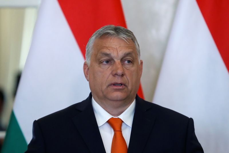 &copy; Reuters. FILE PHOTO: Hungarian Prime Minister Viktor Orban speaks as he and Hungarian President Janos Ader give a statement to the media after their talks at the Presidential Palace in Budapest, Hungary, April 29, 2022. REUTERS/Bernadett Szabo