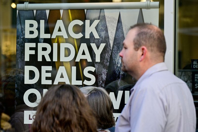 &copy; Reuters. FILE PHOTO: A general view of a sign highlighting discounted items as Black Friday sales begin at The Outlet Shoppes of the Bluegrass in Simpsonville, Kentucky, U.S., November 26, 2021. REUTERS/Jon Cherry/File Photo