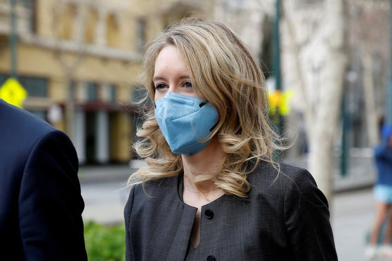 &copy; Reuters. FILE PHOTO: Theranos founder Elizabeth Holmes  and her family leave the federal courthouse after attending her fraud trial in San Jose, California, U.S. January 3, 2022.  REUTERS/Brittany Hosea-Small/File Photo