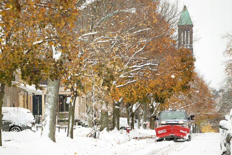 &copy; Reuters. A view of a truck with plow on the street during a snowstorm as extreme winter weather hits Buffalo, New York, U.S., November 18, 2022.  REUTERS/Lindsay DeDario