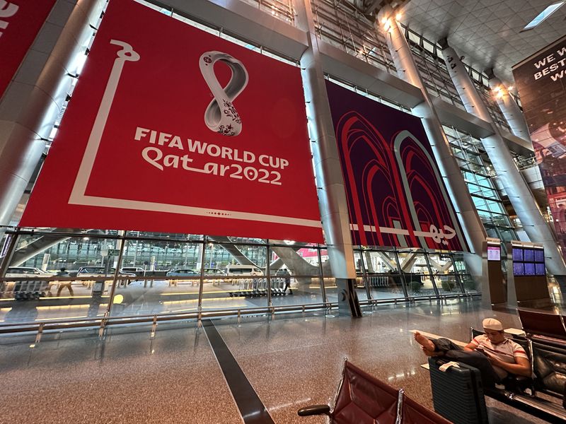 &copy; Reuters. FILE PHOTO: Soccer Football - FIFA World Cup Qatar 2022 Preview - Doha, Qatar - October 14, 2022 Fifa World Cup 2022 branding is seen at Hamad International Airport REUTERS/Hamad I Mohammed