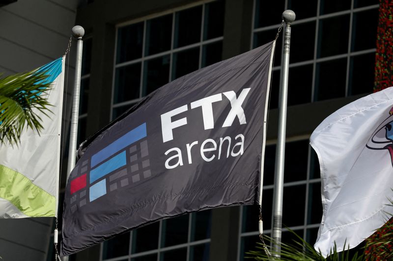 &copy; Reuters. FILE PHOTO: The logo of FTX is seen on a flag at the entrance of the FTX Arena in Miami, Florida, U.S., November 12, 2022. REUTERS/Marco Bello/File Photo