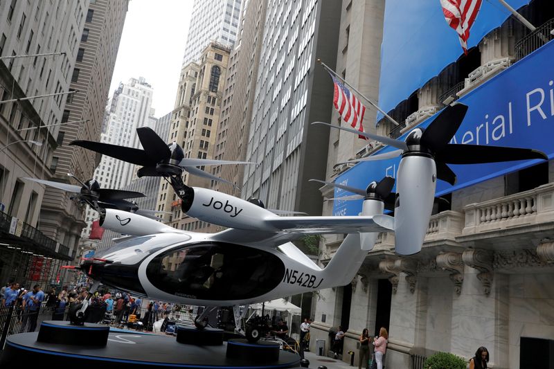 &copy; Reuters. FILE PHOTO: A Joby Aviation Air Taxi is seen outside of the New York Stock Exchange (NYSE) ahead of their listing in Manhattan, New York City, U.S., August 11, 2021. REUTERS/Andrew Kelly/File Photo