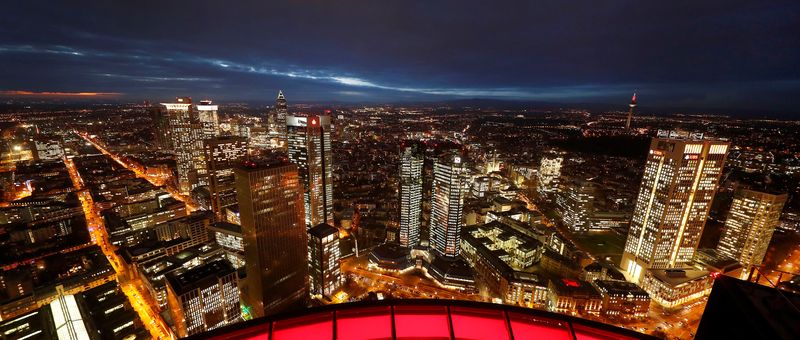 &copy; Reuters. FILE PHOTO: The financial district with the headquarters of Germany's largest business bank, Deutsche Bank (C), is photographed on early evening in Frankfurt, Germany, January 29, 2019.  REUTERS/Kai Pfaffenbach/File Photo