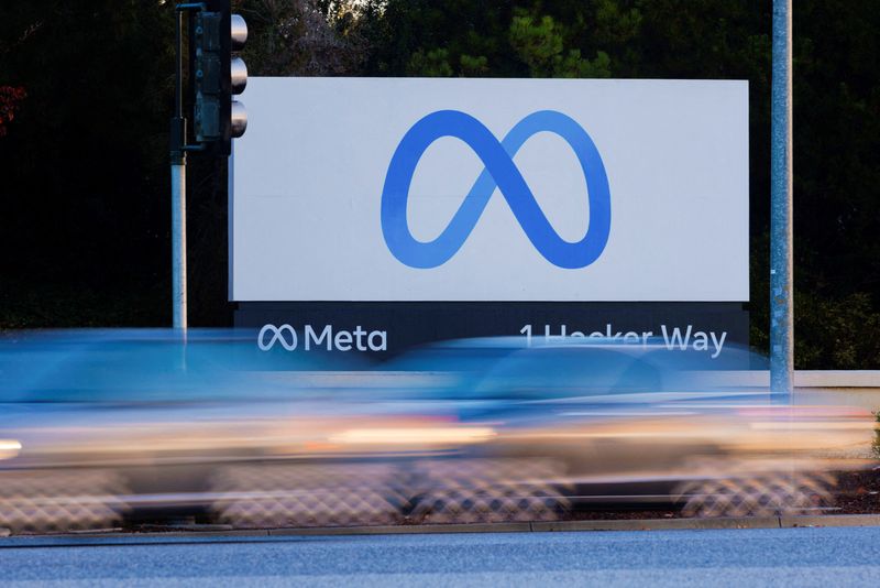 &copy; Reuters. FILE PHOTO: Morning commute traffic streams past the Meta sign outside the headquarters of Facebook parent company Meta Platforms Inc in Mountain View, California, U.S. November 9, 2022. REUTERS/Peter DaSilva