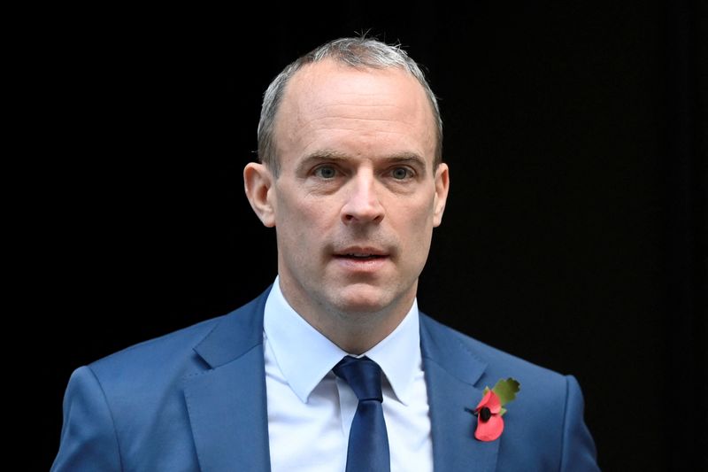 © Reuters. FILE PHOTO: British Deputy Prime Minister and Justice Secretary Dominic Raab walks outside Number 10 Downing Street, in London, Britain November 8, 2022. REUTERS/Toby Melville
