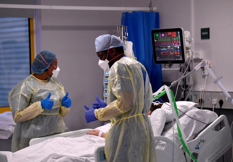 &copy; Reuters. FILE PHOTO: Nurses react as they treat a COVID-19 patient in the ICU (Intensive Care Unit) at Milton Keynes University Hospital, amid the spread of the coronavirus disease (COVID-19) pandemic, Milton Keynes, Britain, January 20, 2021. REUTERS/Toby Melvill