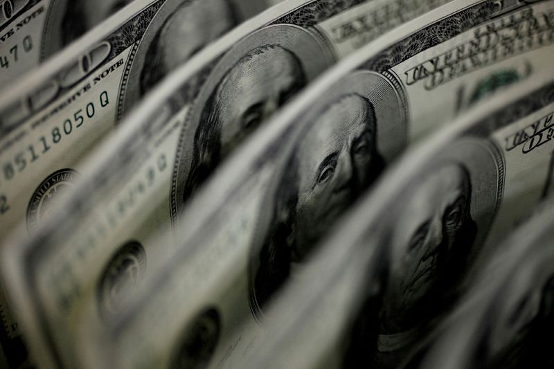 Dollar edges up in range-bound holiday markets