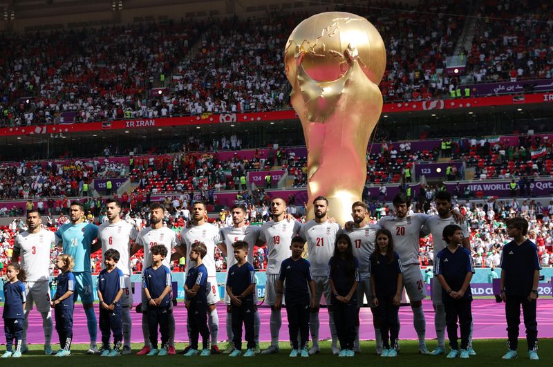 Iran players sing national anthem at World Cup match