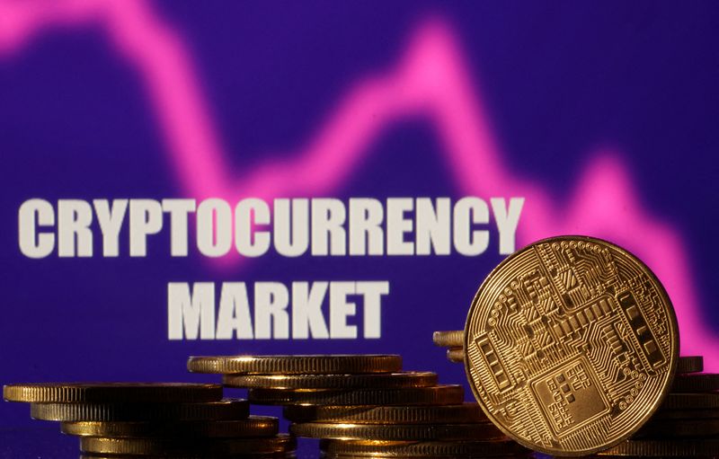 &copy; Reuters. Photo d'illustration des crypto-monnaies avec la mention "cryptocurrency market". /Photo prise le 10 novembre 2022/REUTERS/Dado Ruvic
