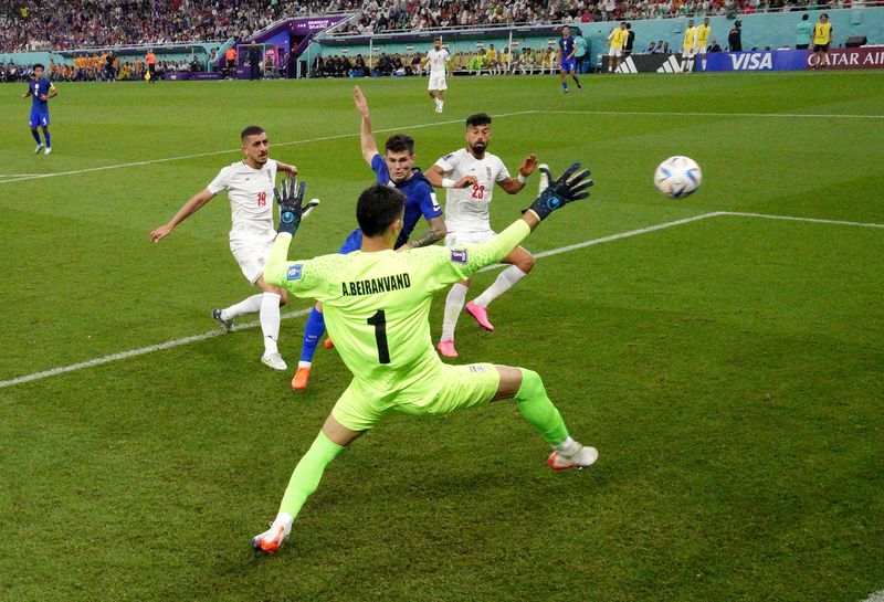 &copy; Reuters. Soccer Football - FIFA World Cup Qatar 2022 - Group B - Iran v United States - Al Thumama Stadium, Doha, Qatar - November 29, 2022 Christian Pulisic of the U.S. scores their first goal Pool via REUTERS/Stuart Franklin