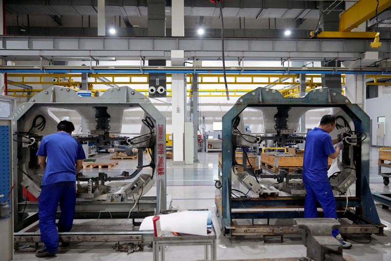 China factory, services activities slide to 7-month lows on COVID curbs