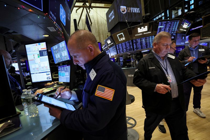 &copy; Reuters. FILE PHOTO: Traders work on the floor of the New York Stock Exchange (NYSE) in New York City, U.S., November 29, 2022.  REUTERS/Brendan McDermid