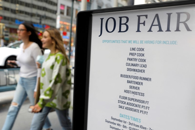 &copy; Reuters. FILE PHOTO: Signage for a job fair is seen on 5th Avenue in Manhattan, New York City, U.S., September 3, 2021. REUTERS/Andrew Kelly