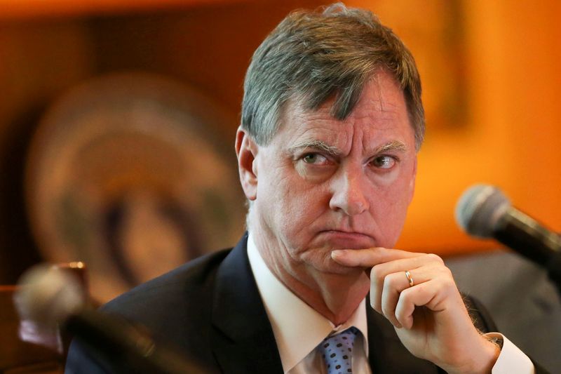 Fed's Evans sees slower rate hike pace, 