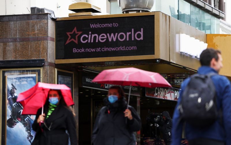 &copy; Reuters. People walk past a Cineworld in Leicester's Square, amid the coronavirus disease (COVID-19) outbreak in London, Britain, October 4, 2020. REUTERS/Henry Nicholls/File Photo
