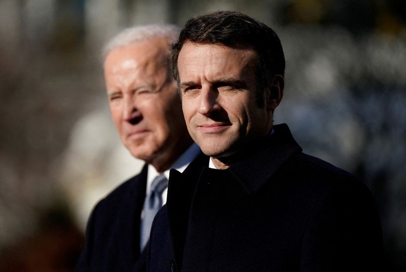 &copy; Reuters. FILE PHOTO: French President Emmanuel Macron and U.S. President Joe Biden stand together onstage during an official State Arrival Ceremony for President Macron on the South Lawn of the White House in Washington, U.S., December 1, 2022. REUTERS/Elizabeth F