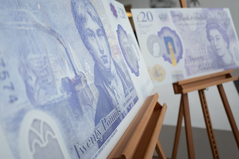 &copy; Reuters. FILE PHOTO: Large scale samples of the new twenty pound note are displayed during the launch event for the new note design at the Turner Contemporary gallery in Margate, Britain, October 10, 2019. Leon Neal/Pool via REUTERS