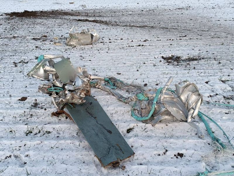 © Reuters. Parts of a Russian cruise missile shot down by the Ukrainian Air Defence Forces, amid Russia's attack on Ukraine, are seen in a field in Kyiv region, Ukraine December 5, 2022.  Head of the National Police of Kyiv region Andrii Nebytov via Telegram/Handout via REUTERS 