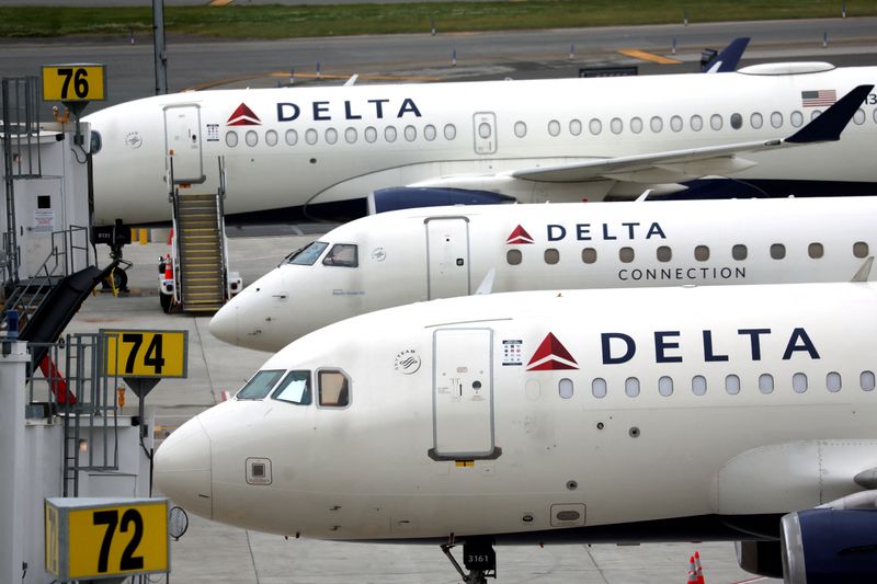 &copy; Reuters. FILE PHOTO: Delta Airlines passenger jets are pictured outside the newly completed 1.3 million-square foot $4 billion Delta Airlines Terminal C at LaGuardia Airport in the Queens borough of New York City, New York, U.S., June 1, 2022. REUTERS/Mike Segar/F