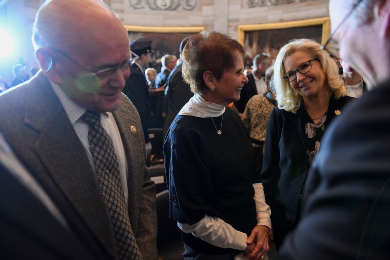 &copy; Reuters. U.S. Representative Liz Cheney (R-WY) greets Charles and Gladys Sicknick, parents of slain Capitol Police Officer Brian Sicknick, before Members of Congress honor the U.S. Capitol Police, the Washington D.C. Metropolitan Police and others who protected th