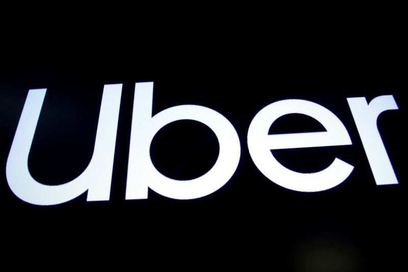 &copy; Reuters. FILE PHOTO: A screen displays the company logo for Uber Technologies Inc. on the day of it's IPO at the New York Stock Exchange (NYSE) in New York, U.S., May 10, 2019. REUTERS/Brendan McDermid/File Photo/File Photo