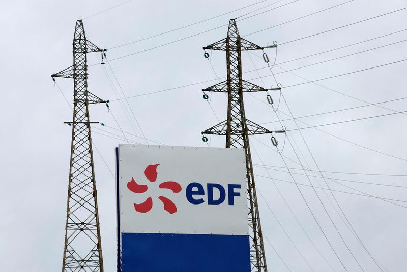 &copy; Reuters. FILE PHOTO: The logo of Electricite de France (EDF) is seen in front of electrical pylons at the Tricastin nuclearÊpower plant site in Saint-Paul-Trois-Chateaux, France, November 21, 2022.    REUTERS/Eric Gaillard/File Photo