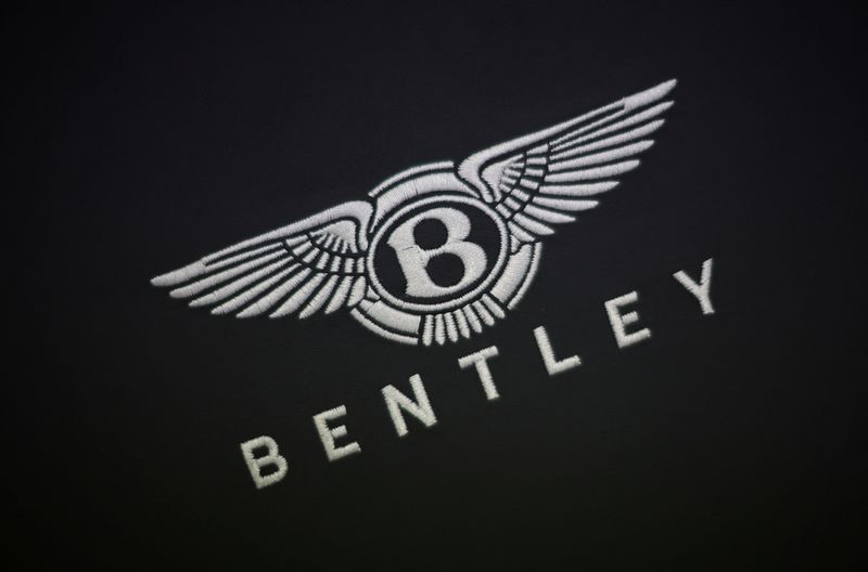 © Reuters. A company logo is seen stitched to a piece of leather inside the Bentley factory in Crewe, Britain, December 7, 2022. REUTERS/Phil Noble